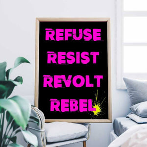 A wall print with bold pink typography that reads Refuse, Resist, Revolt, Rebel.
