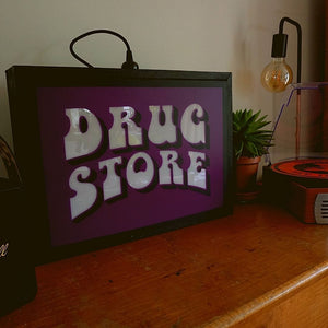 Drugstore- Lightbox Famous Rebel