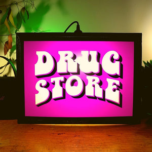 Drugstore- Lightbox Famous Rebel